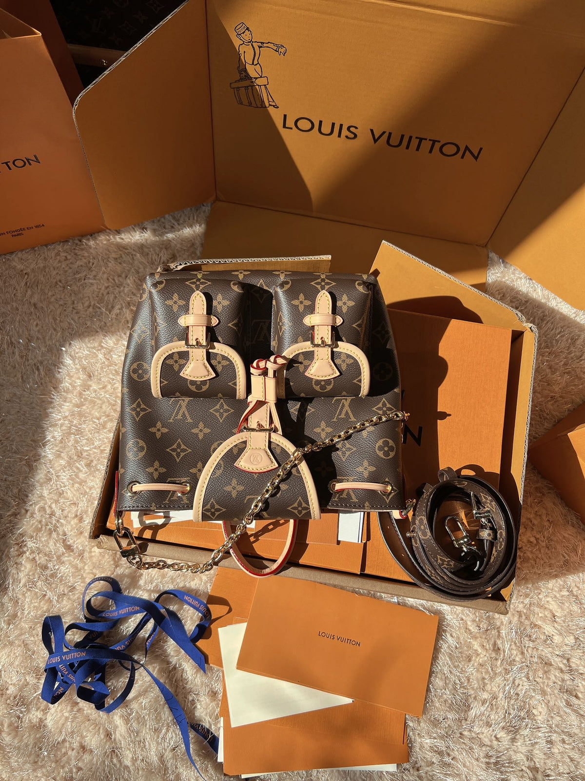 LV Excursion PM Monogram Canvas Backpack Shoulder Bag with Leather Trim and Drawstring Closure
