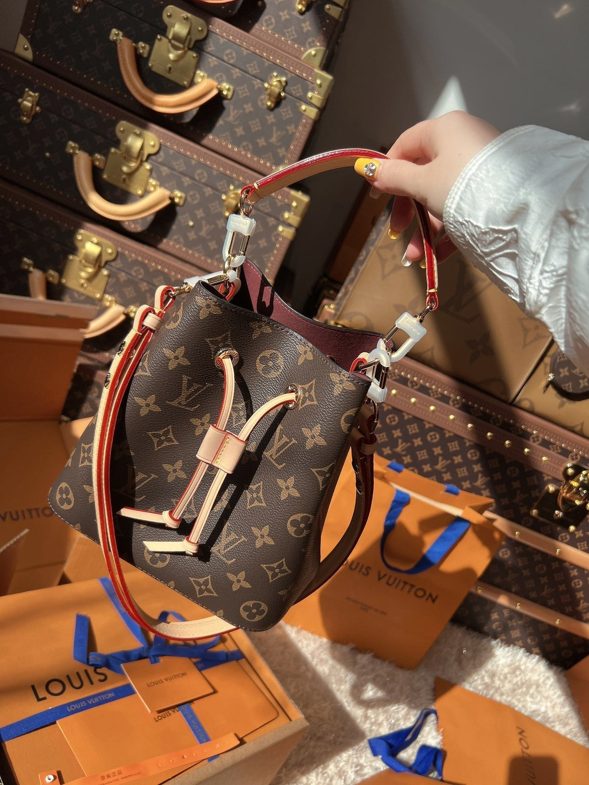 LV Neonoé Monogram Canvas Bucket Bag with Leather Trim and Shoulder Strap