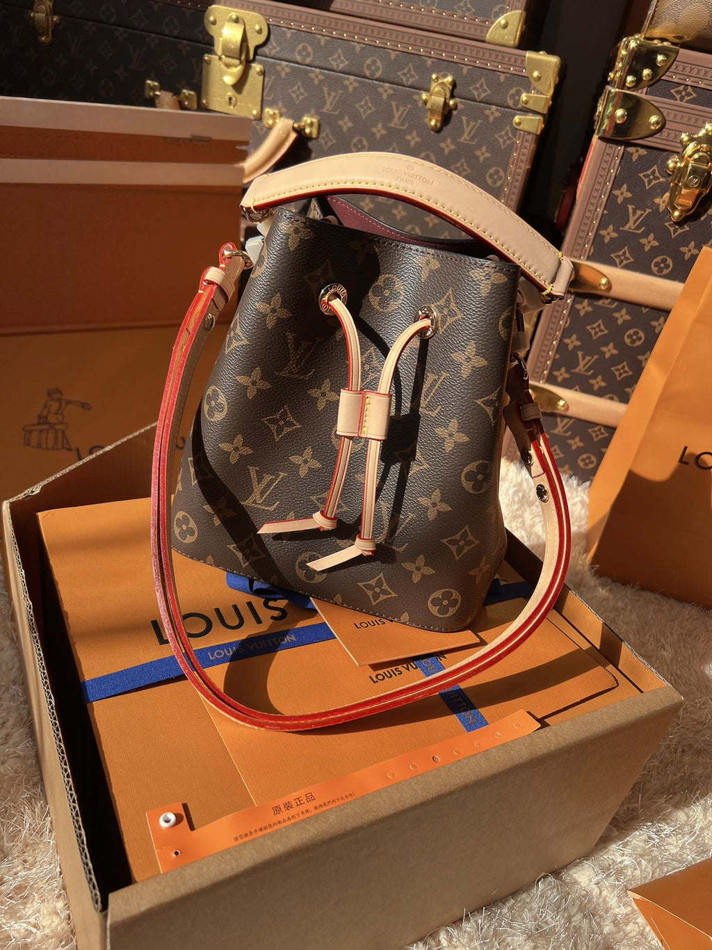 LV Neonoé Monogram Canvas Bucket Bag with Leather Trim and Shoulder Strap
