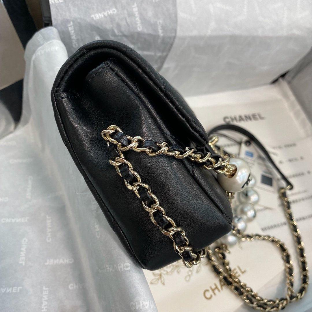 Chanel Pearl Logo Strap Flap Bag Black