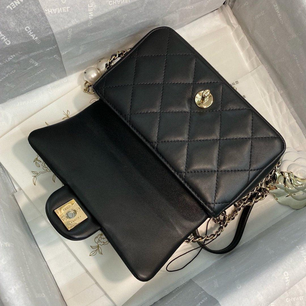 Chanel Pearl Logo Strap Flap Bag Black
