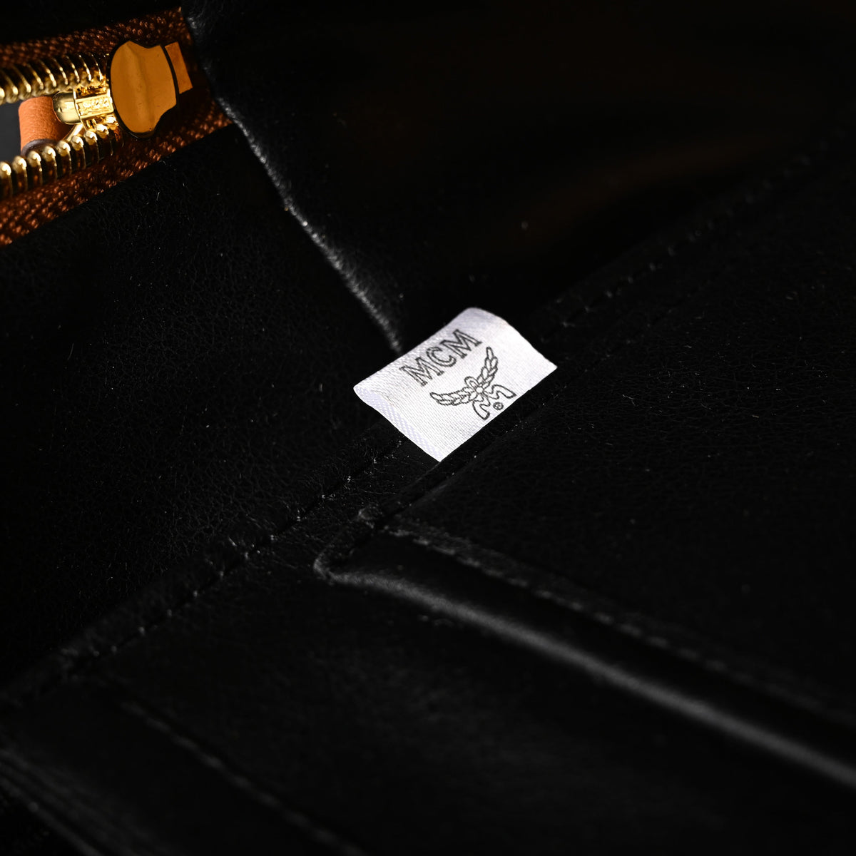 Mcm Stark Visetos Medium Backpack – Cognac Monogram with Gold-Tone Studs - Cognac with Black Monogram Print