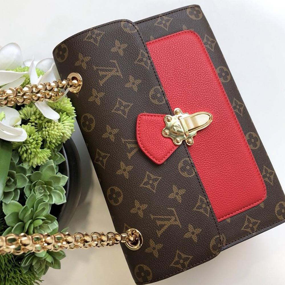 Louis Vuitton Victoire Handbag