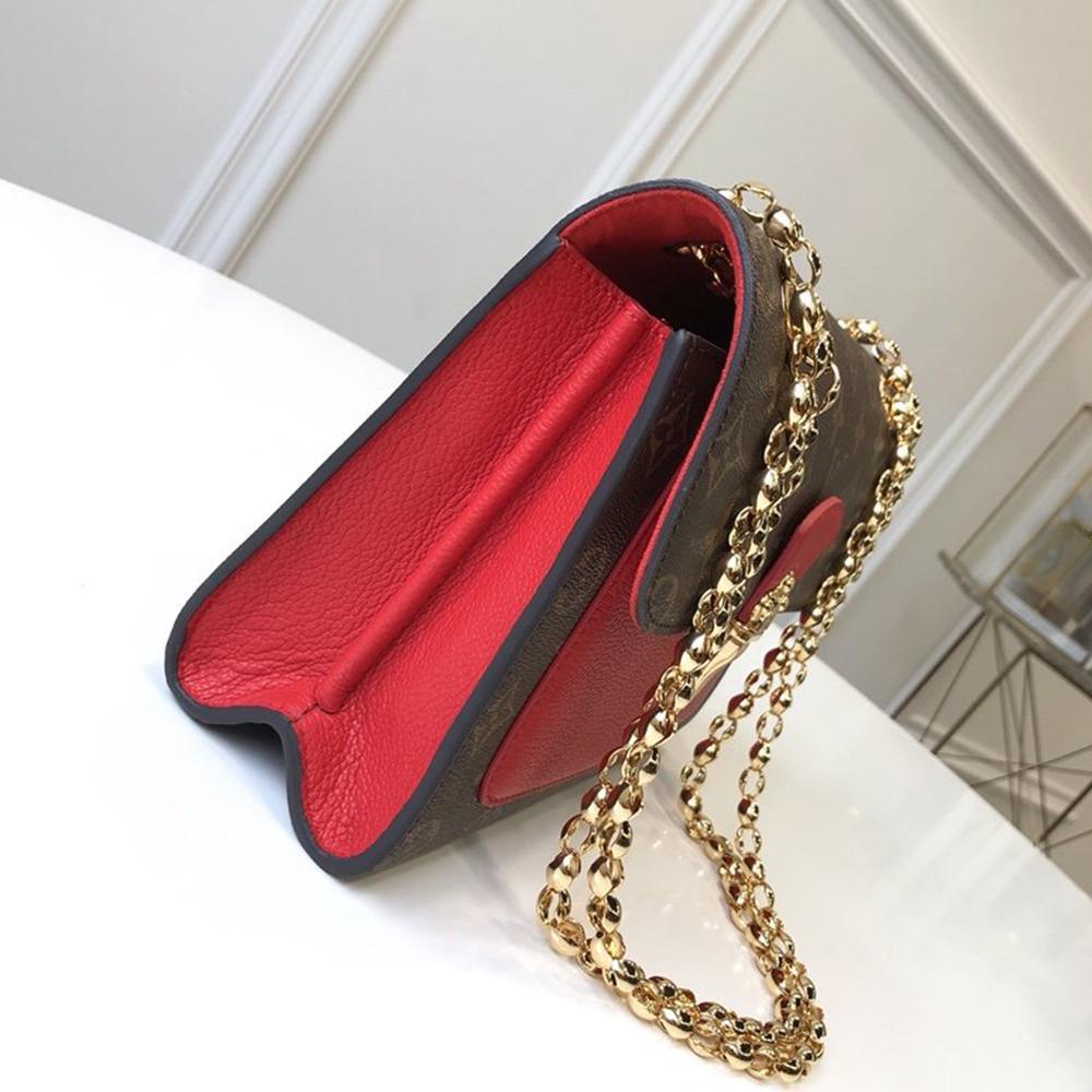 Louis Vuitton Victoire Handbag